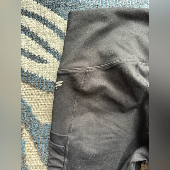 Fabletics $89 Black Fabletics On-The-Go PowerHold® High-Waisted Pocket Leggings - Picture 6 of 7